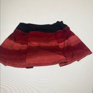 Lululemon pink and orange striped pace rival tennis skirt